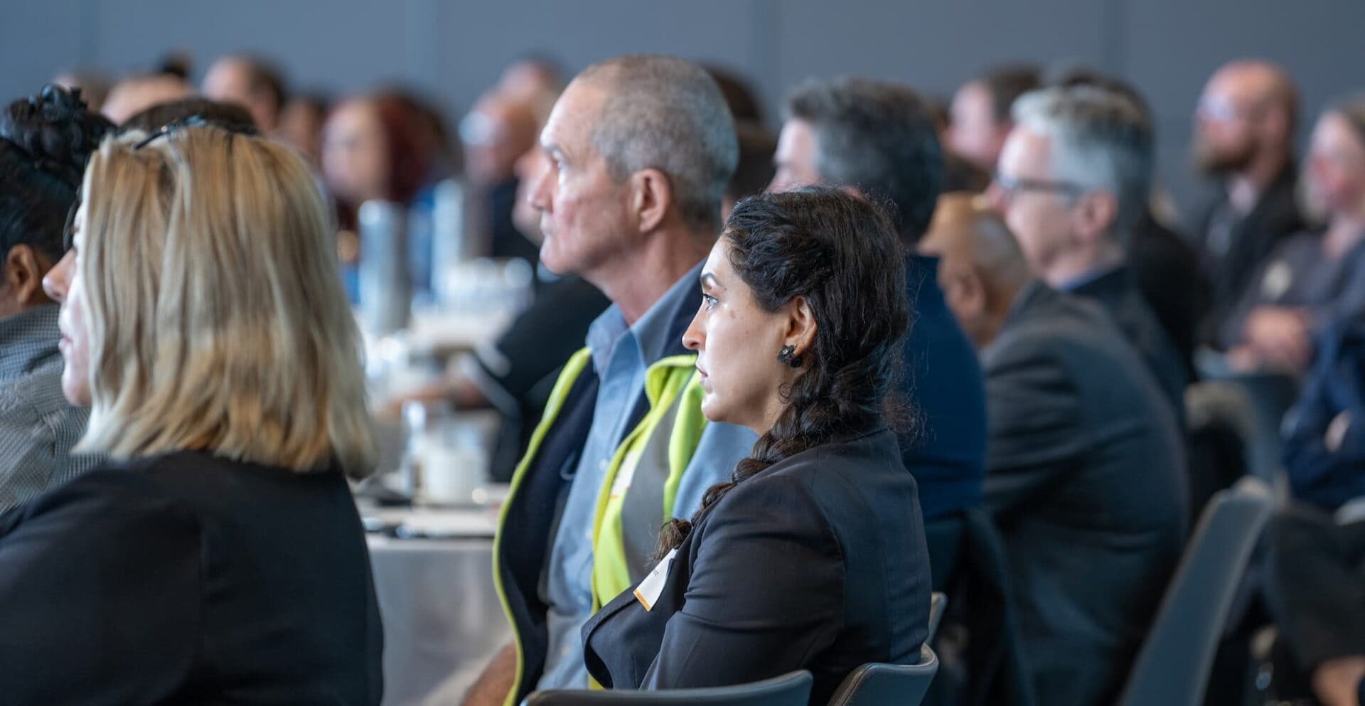 people listening to a conference